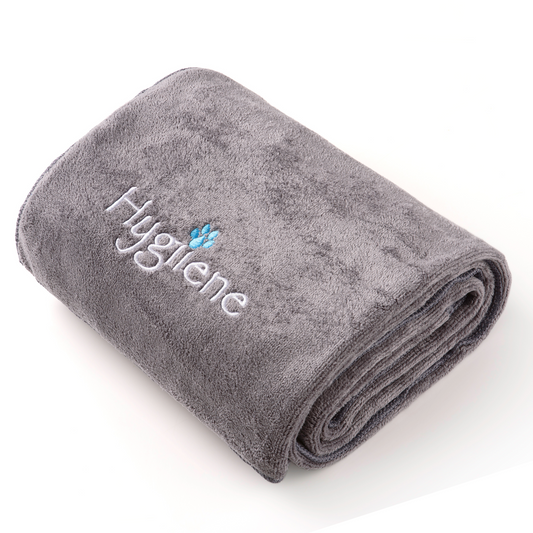 image of folded gray HYGIIENE pet towel with the HYGIIENE logo embroidered on it